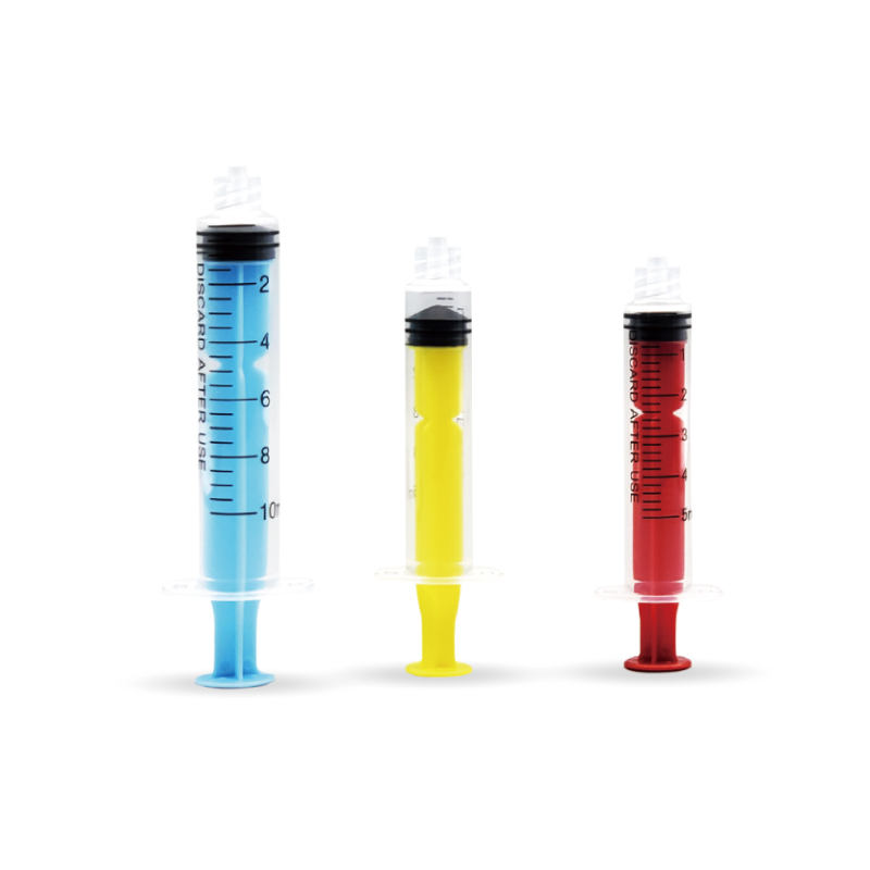 Color irrigation syringes
